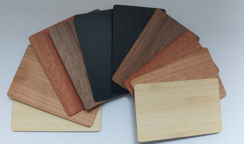 Wooden NFC cards in a range of colours